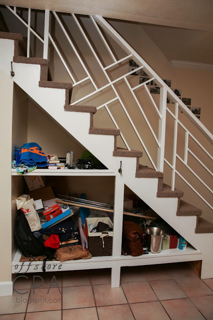 Stair bearing plates. The space under a staircase can be used to clear everyday clutter.