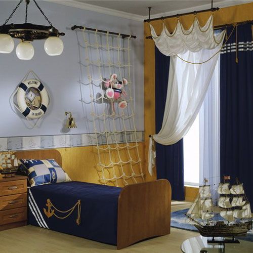 There are so many different ways to decorate a nautical themed room. Boats, ships, sailors, sea flags, treasure map, pirates, sea animals, shells, lighthouses, palm trees, tropical beach, surf hut, cottage style by the sea, rustic hut style and toddlers. Bring a maritime feel to your little boy's bedroom with one of these ideas.