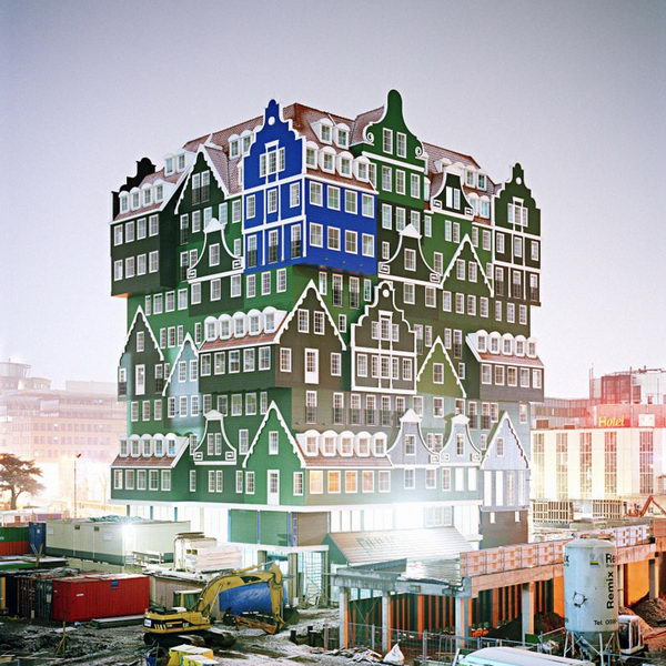 Stacked houses: New hotel in Amsterdam. This is a hotel that looks like a cluster of traditional Dutch houses, all grafted in light green and blue. The structure is a lively cluster of different examples of these traditional houses, ranging from the notary residence to the workers' hut.