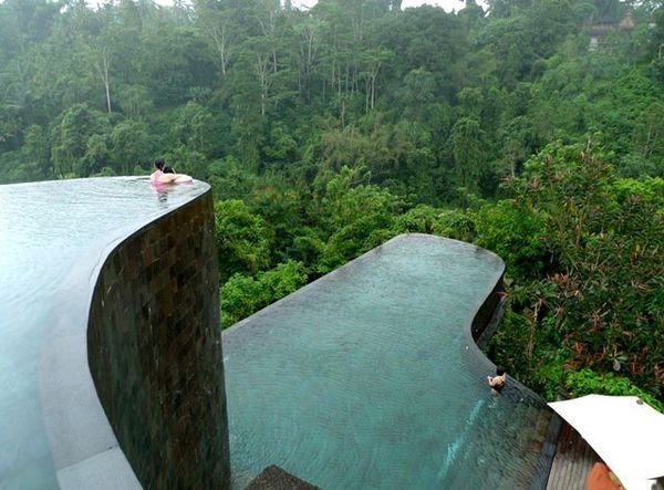 Ubud Hanging Gardens Hotel in Bali. This hotel features a towering, multi-level infinity pool that looks like a natural cliff and is actually designed to mimic the surrounding hills. In addition to the two main pools, each of the 38 rooms at Ubud has its own mini infinity pool with a view of the nearby Pura Penataran Dalem Segara temple.