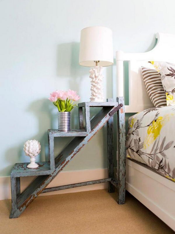 It's a cool idea to turn a garden ladder into a vintage-style bedside table.