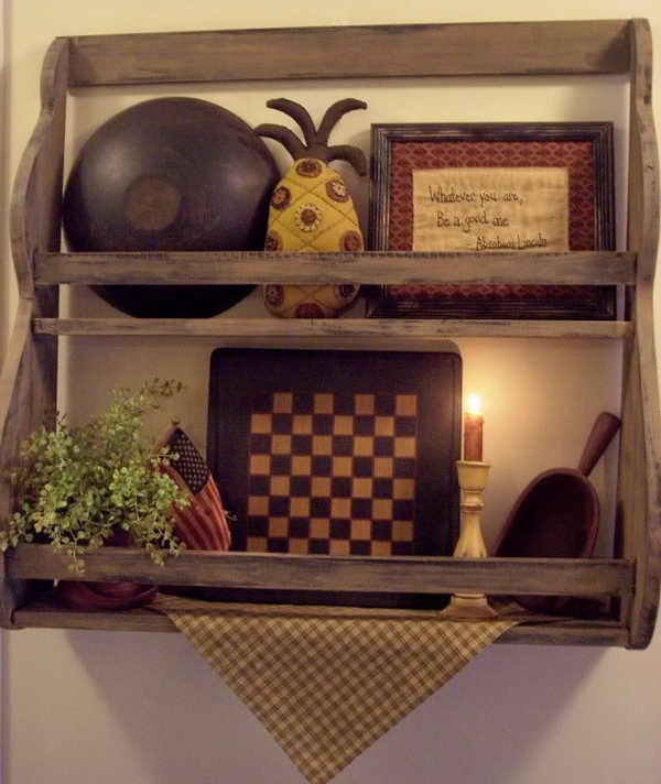 Primitive shelf decoration. Mix a game board with an antique bowl, sampler, and more to add interest to a shelf. The mix of color and texture is great.