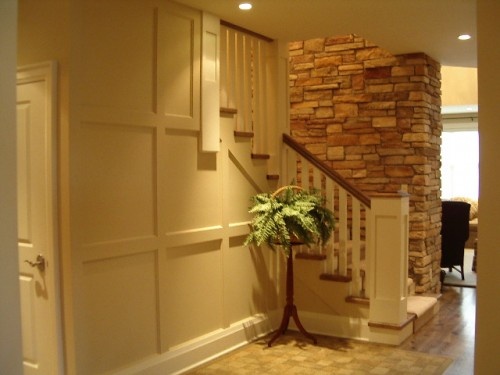 White trim and rustic rock,