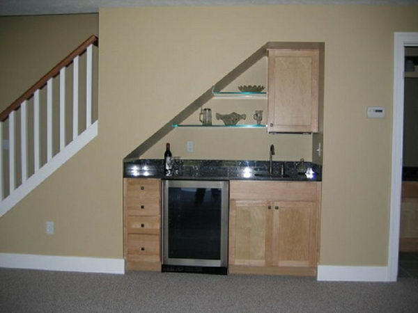 Small under stair wet bar for basements.
