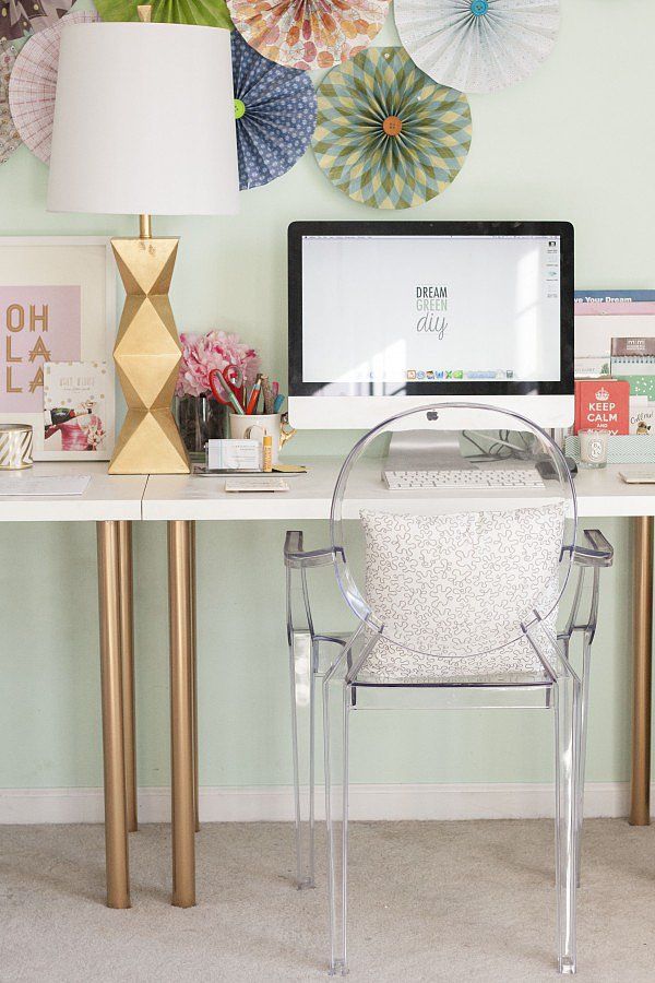 Long-legged gold desk. Gold is always associated with luxury and power. With a little gold spray paint, this simple IKEA desk has been given a metallic makeover to give the workspace a coherent look. more details 