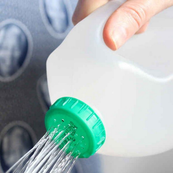 Make a watering can from a gallon jug 