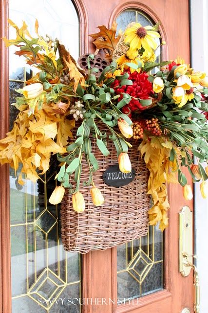 not exactly a wreath but an awesome door basket | Fall door .