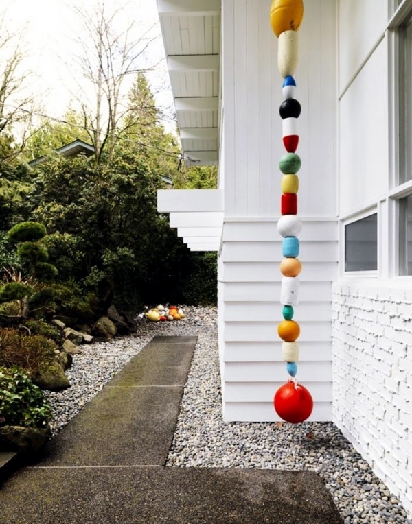 The rain chain downspout instead serves as a creative decoration .