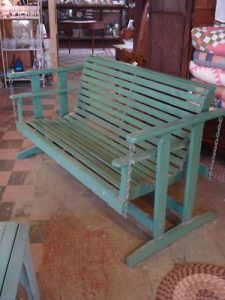 vintage wooden porch glider from the 1940's. I have one similar to .