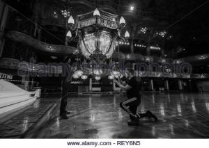 Blackpool Tower's two huge chandeliers are cleaned in preparation .