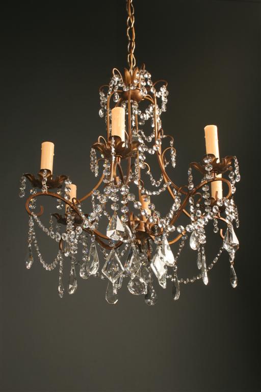 6 arm antique iron and crystal Italian chandelie