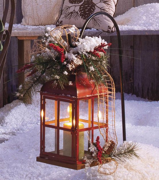 A lantern makes a pretty outdoor holiday decoration .