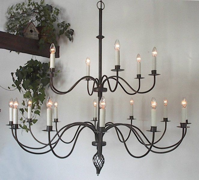 LOOOOVE wrought iron chandeliers. 60 inch diameter! Wouldn't this .