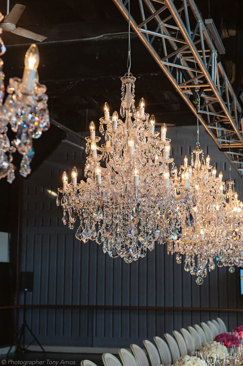 Katerina' chandeliers, hand-threaded with European lead crystal .