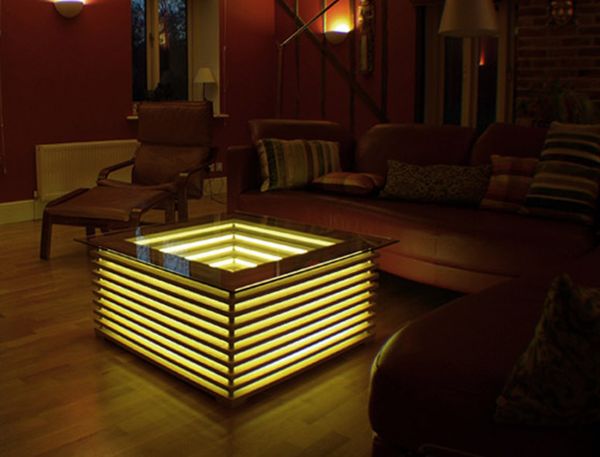 Sqill Illuminating Coffee Table by David Chapman glows like a lamp .