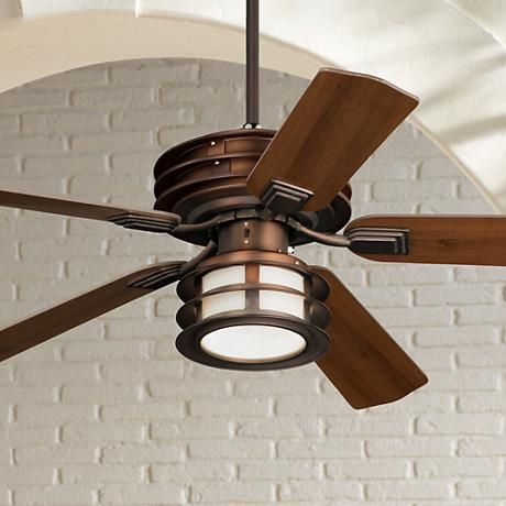 A handsome Mission style outdoor ceiling fan with reversible .