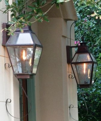 Gas Lanterns... SOOO pretty instead of traditional front porch .