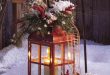 A lantern makes a pretty outdoor holiday decoration .