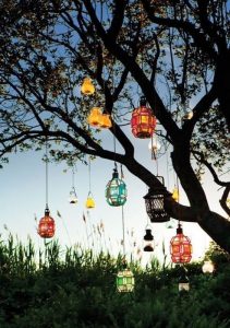 dangling lanterns from trees #lanterns | Tree lanterns, Surf shack .