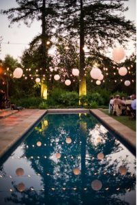 pool + lanterns...love, love, love strung over the pool which is .