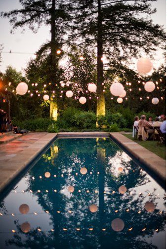 pool + lanterns...love, love, love strung over the pool which is .