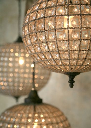 sparkly chandeliers, cluster a few of these at varying heights .