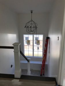 Height for hanging chandelier in stairwe