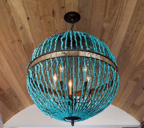 Turquoise orb beaded chandelier. Currey and Co Alberto orb .