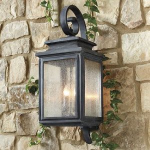 The Dawson Outdoor Lantern's weathered zinc finish, tiered top .