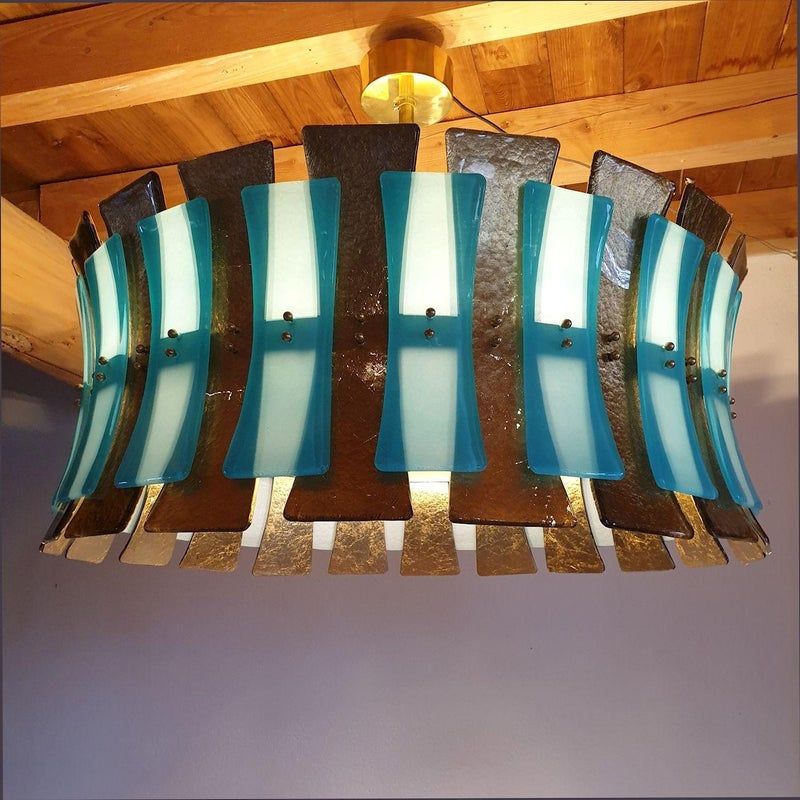 Turquoise Drum Chandeliers: Add Elegance to Your Home with this Stunning Lighting Fixture